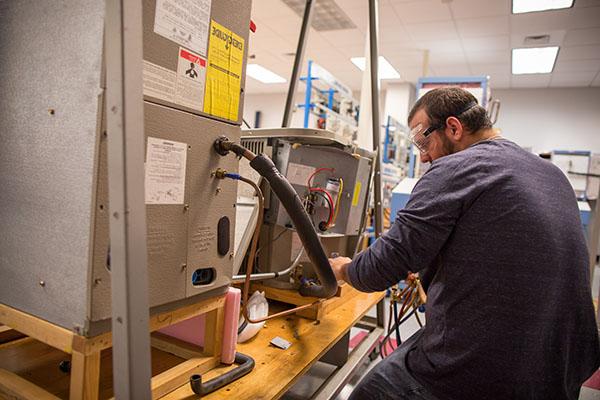 HVAC student working